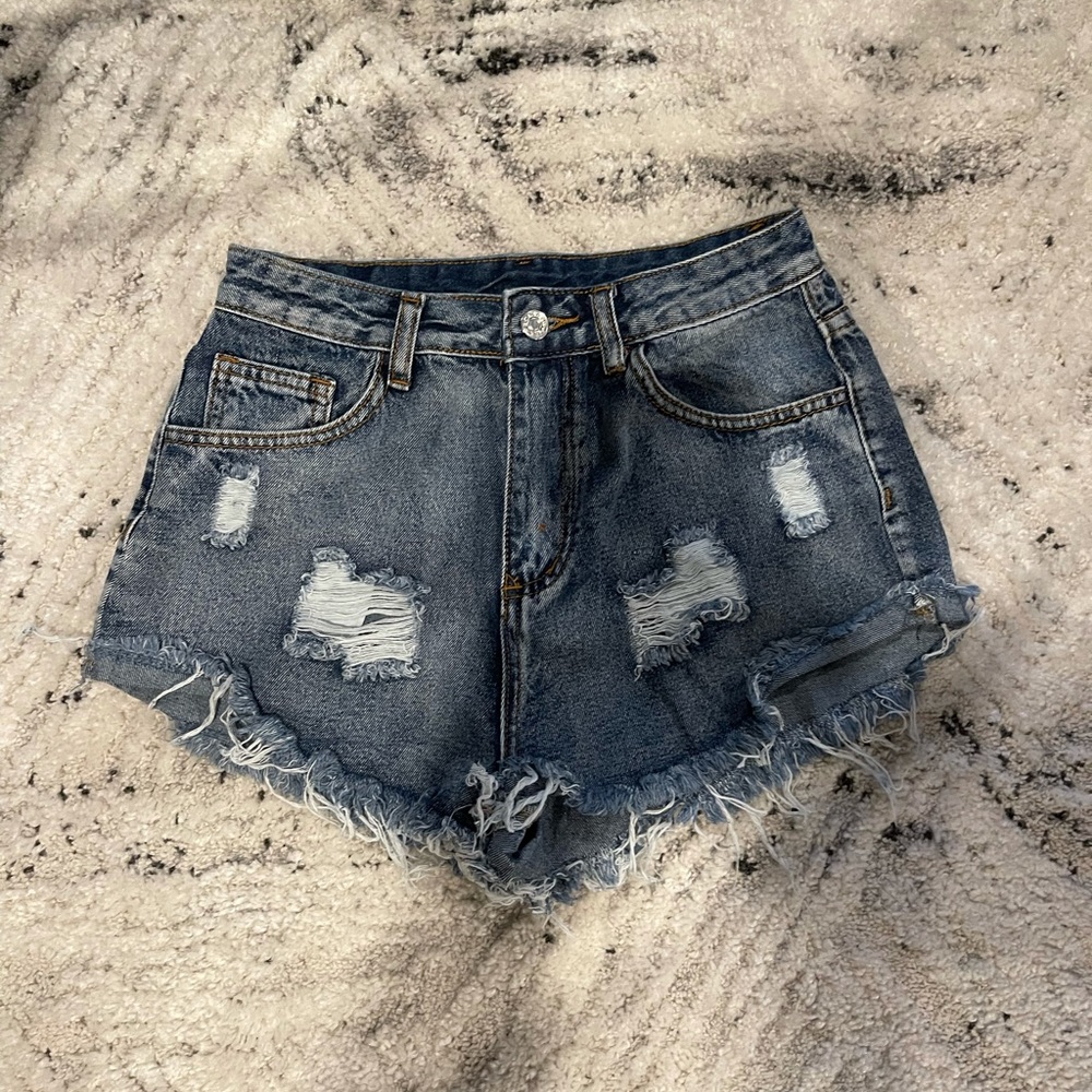 Distressed high waisted denim shorts
